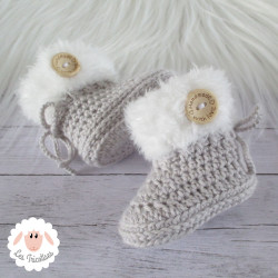 Chaussons bébé en laine bordure fourrure