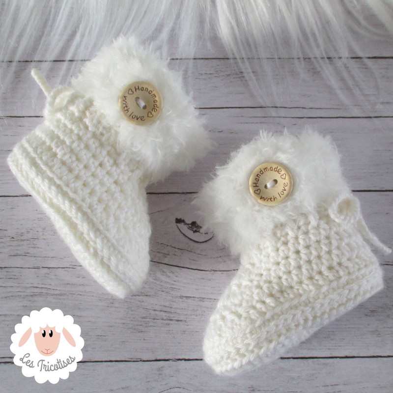 Chaussons bébé en laine bordure fourrure