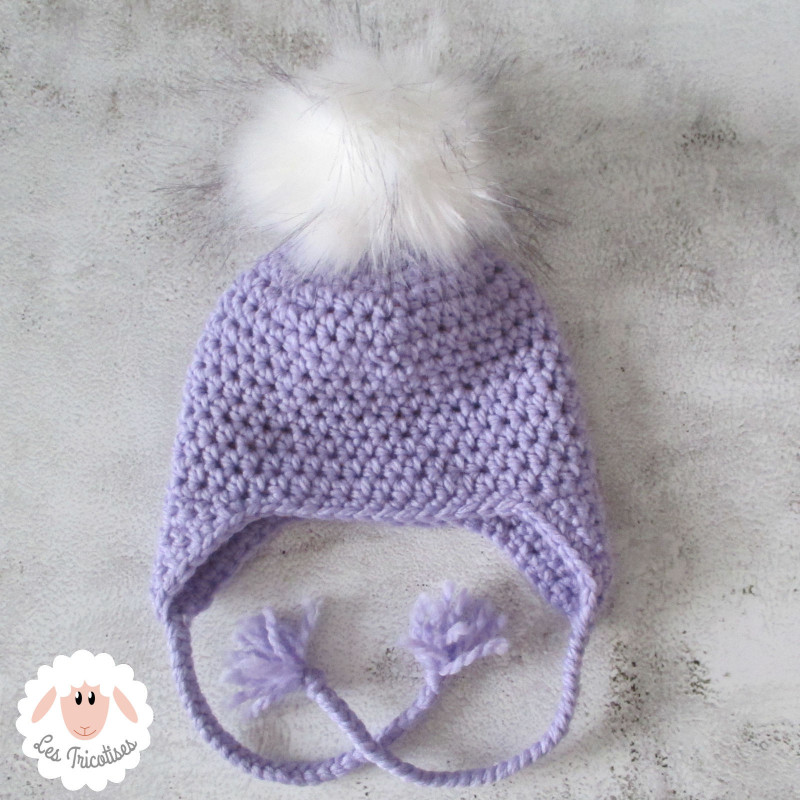 Bonnet style péruvien à pompon en fausse fourrure