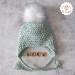 Bonnet style péruvien à pompon en fausse fourrure
